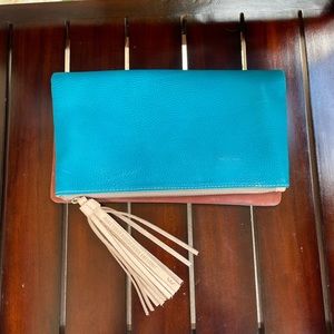 Consuela Peacock fold over clutch